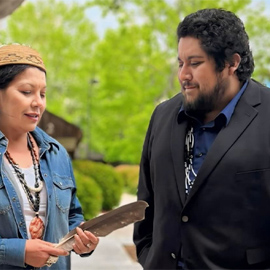 Tishmall Turner, M.B.A., Former Vice Chair, Rincon Band of Luiseño Indians (Left), talks with Alec Calac, Ph.D., Pauma Band Luiseño Indians and UC San Diego Medical Student.